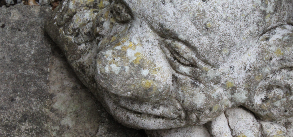 Stone carving of a troll