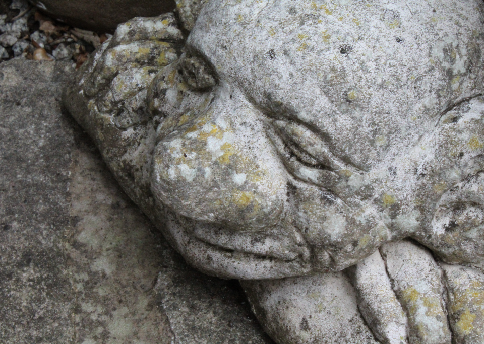 Stone carving of a troll