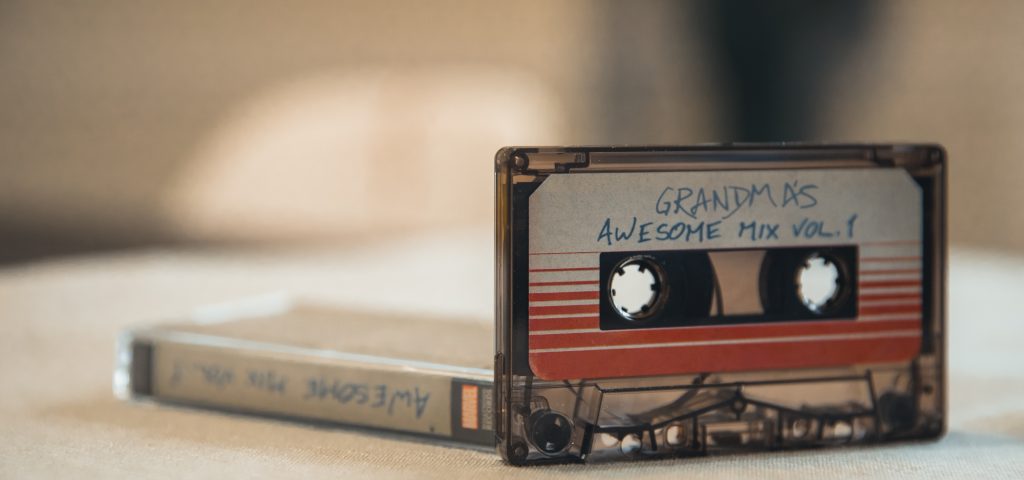 Bandwidth and Scarcity blog image of cassette tape labeled Grandma's Awesome Mix Vol I