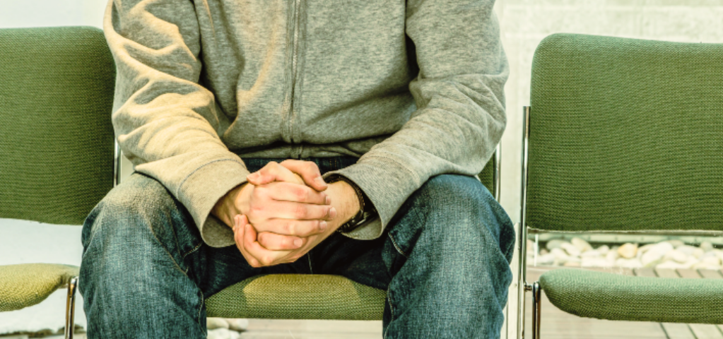 Man in a waiting room.