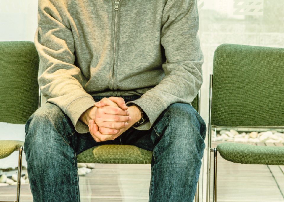 Man in a waiting room.