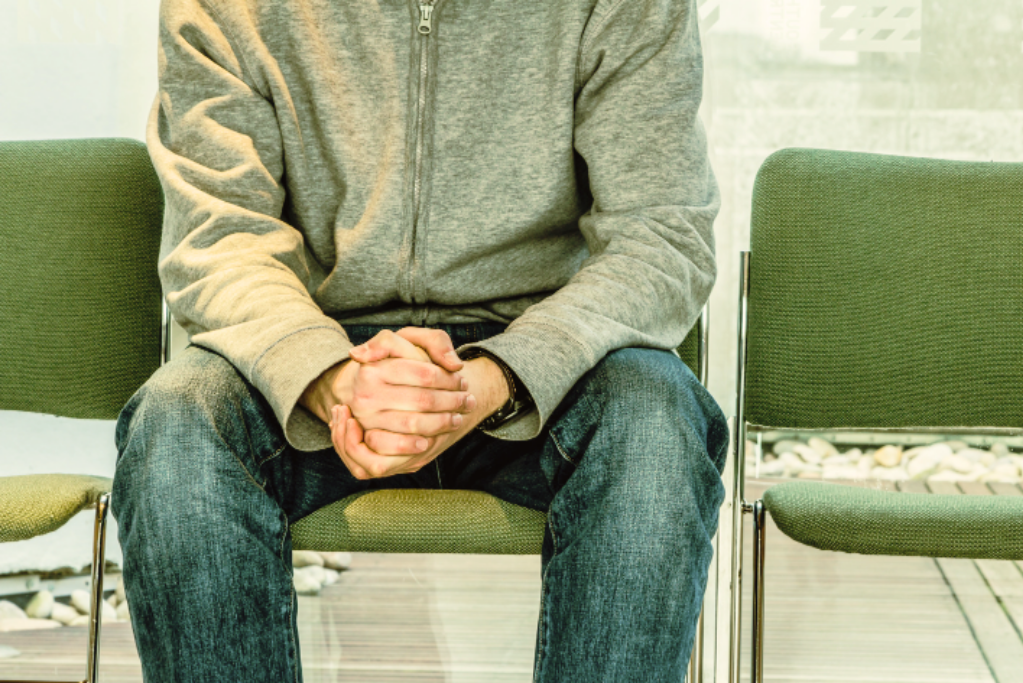 Man in a waiting room.